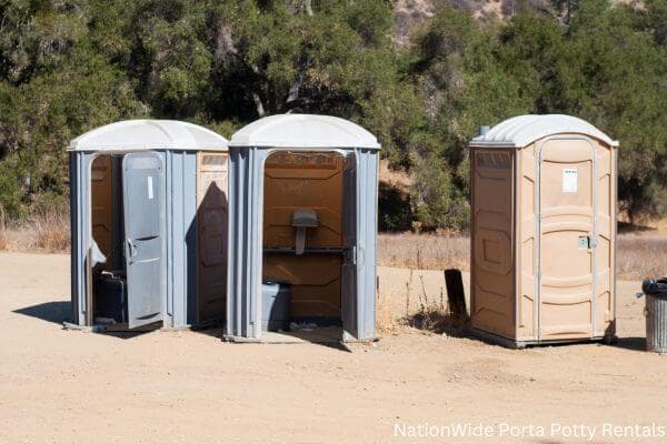 a clean row of portable restrooms for outdoor weddings or festivals in Fruitland, NM